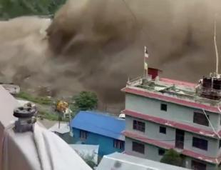 Deadly flood hits Nepal-Tibet border, hundreds unaccounted for