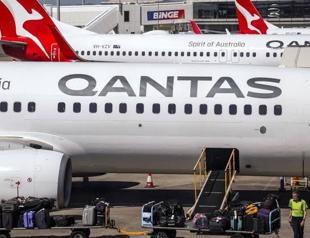 Qantas says profits slump as fuel costs surge