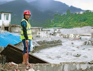 Rescuers dig into tunnel as missing toll from Nepal flood tops 3,000