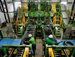 Japan to relax overtime regulation under workaholic PM