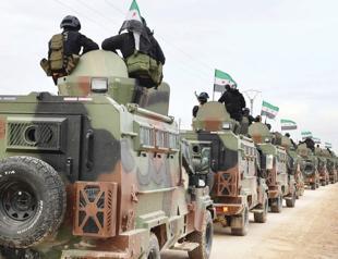 Syria begins SDF heavy weapons handover