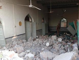 Death toll from attack at police HQ in Pakistan rises to 31