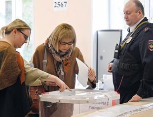 Mass drone barrage on Moscow kills two on election day