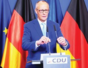 Merz under pressure after bruising state election loss-es