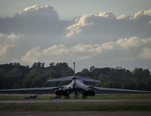 UK police arrest five on suspicion of preparing terrorist act near air base