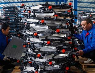 China factory activity returns to growth in September