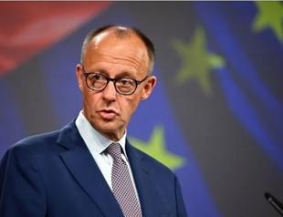Merz visits Kyiv as Russia urges diplomats to leave