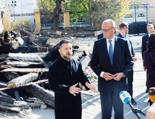 Russian strike hits Kyiv bridge as Merz visits