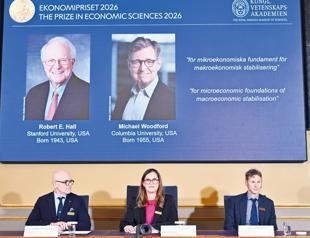 Americans Hall and Woodford win economics Nobel