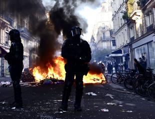 Macron signals protest bans after unrest across France