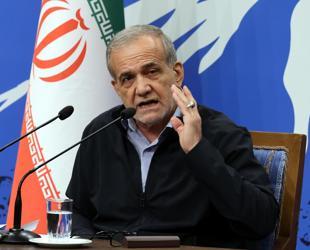 Iranian president warns Trump against risking war