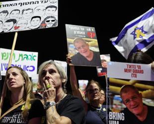 Israel says received remains of 3 Gaza hostages as fragile ceasefire holds