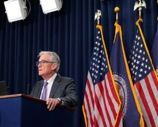 Divided US Fed makes third straight rate cut on jobs risks