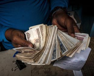 Cubas communist party postpones congress, citing economic crisis