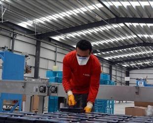 Business morale and capacity utilization edge up in December