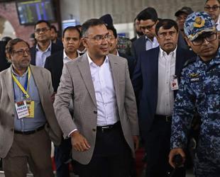 Prime minister hopeful Rahman arrives in Bangladesh