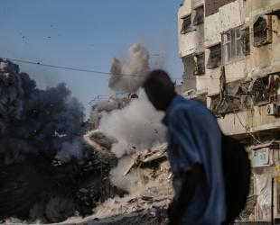 Gaza civil defense says Israeli attacks kill 13 including 5 children