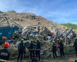 One dead, dozens missing after Philippine dump site collapse