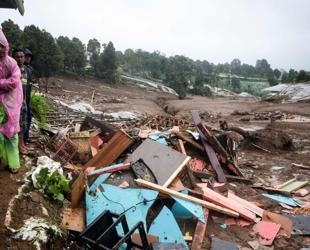 Indonesia resumes search for dozens missing in landslide