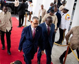 Haitis transitional council hands power to PM