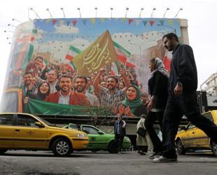 Iran steps up arrests while remaining positive on US talks