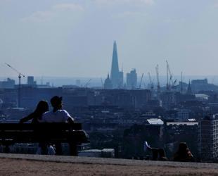 UK unemployment rises to five-year high of 5.2 pct: official