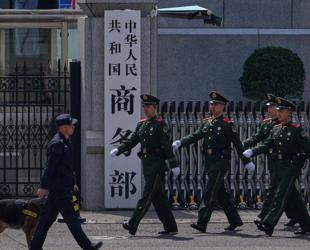 China acts against Japanese companies over military ties