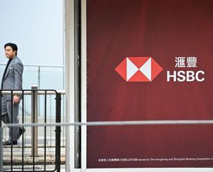 HSBC says its net income fell $1.8 bln to $21.1 bln in 2025