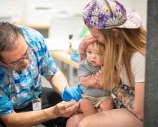 US judge halts implementation of Trump vaccine overhaul