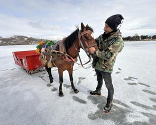 Horse-drawn sleigh season ends at Çıldır Lake as ice thaws