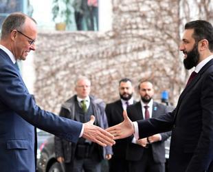 Germany tries to play down row over Syria refugee return