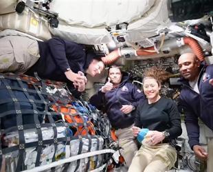 Artemis astronauts pass half-way point on way to Moon