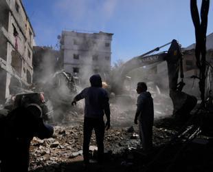 Raid hits Beiruts southern suburbs as Israel says striking Hezbollah