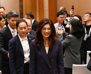 China says it will enhance exchanges with Taiwan