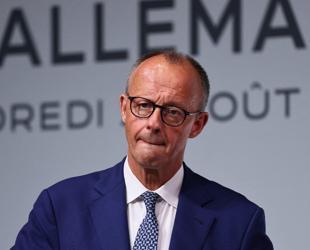 Germanys Merz insists coalition on track after energy prices row