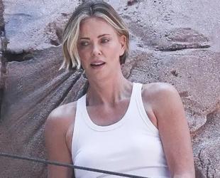 Charlize Theron scales Times Square billboard