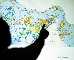 US pauses Hormuz escorts in bid for deal