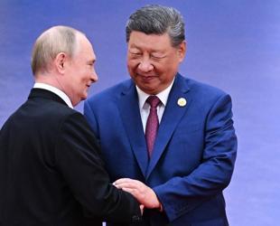 Xi hosts Putin in Beijing days after Trump