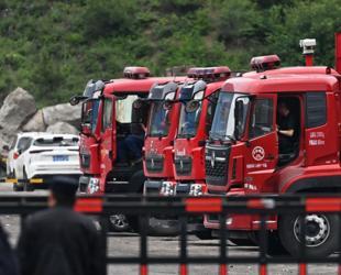 China rescuers search for missing after mine blast kills 82