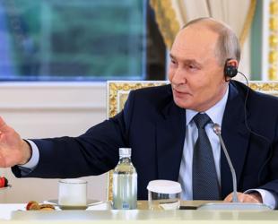 Putin to confront economy at Russian Davos, under threat of Ukrainian drones