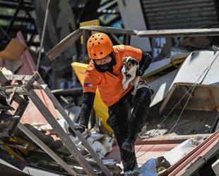 Outdoor hospitals, shaken communities as Philippine quake toll rises