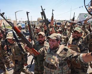 Iraq sets September deadline for integration of armed groups