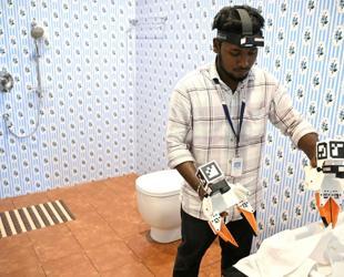 The Indian workers training AI robots to take their jobs