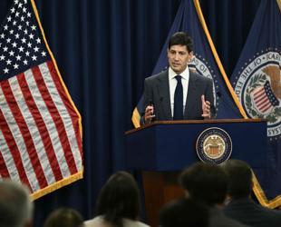 US Federal Reserve holds rates steady, raises inflation expectations