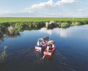 Swelling waterways treat sightseers to scenic boat tours