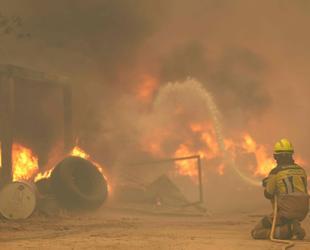 More than 160,000 flee out-of-control wildfires in France, Spain