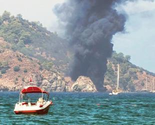 115 jump into sea as tour boat catches fire off Fethiye