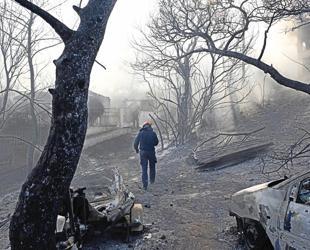 Fires near Athens controlled after claiming two lives