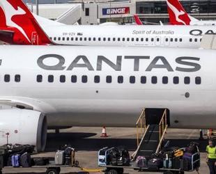 Qantas says profits slump as fuel costs surge