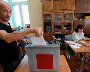 Putin’s party set to retain majority as Russians vote